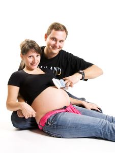 Young Man And His Pregnant Wife Stock Image