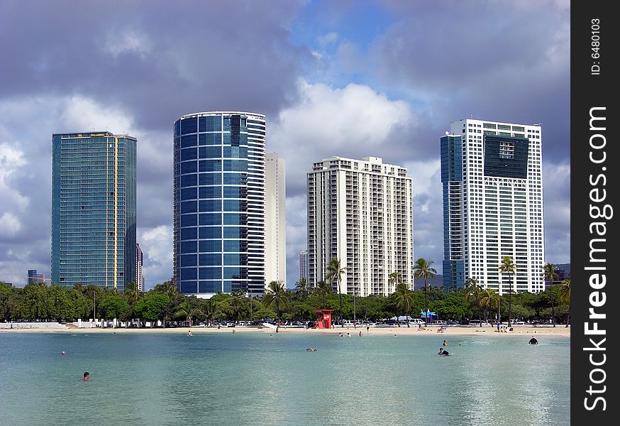 Honolulu skyscrapers next to the beach (Hawaii). Honolulu skyscrapers next to the beach (Hawaii).