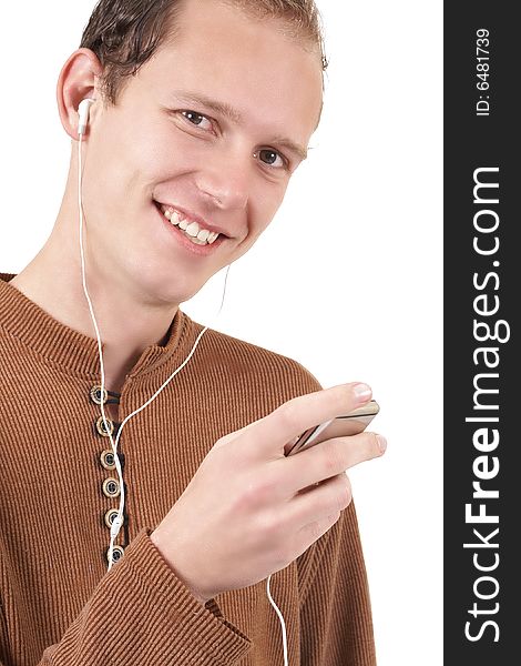 Young caucasian man wearing trendy clothes listening to music. Isolated on white background. Young caucasian man wearing trendy clothes listening to music. Isolated on white background