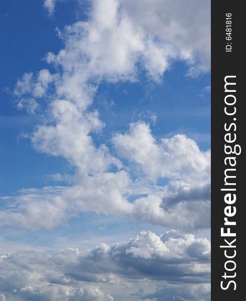 White clouds in a blue sky. Great background. White clouds in a blue sky. Great background