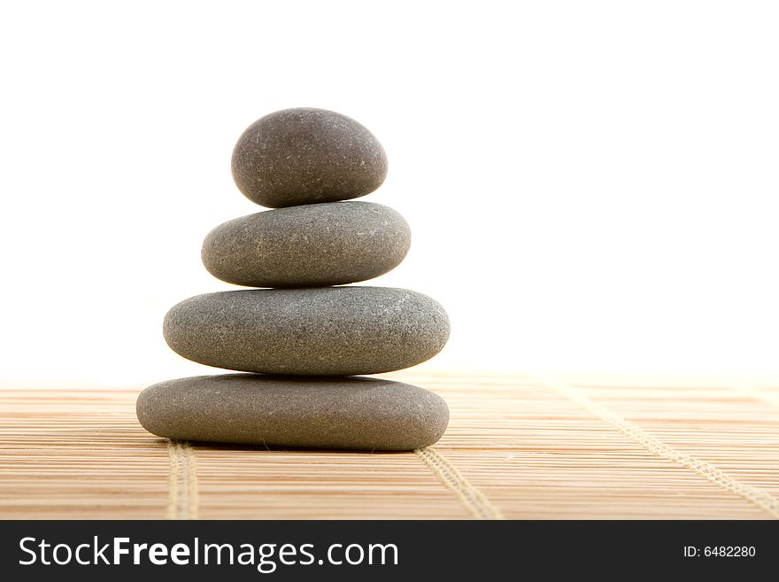 Balanced stones isolated on the white background