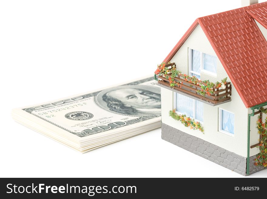 Miniature House and Money. Buying house concept