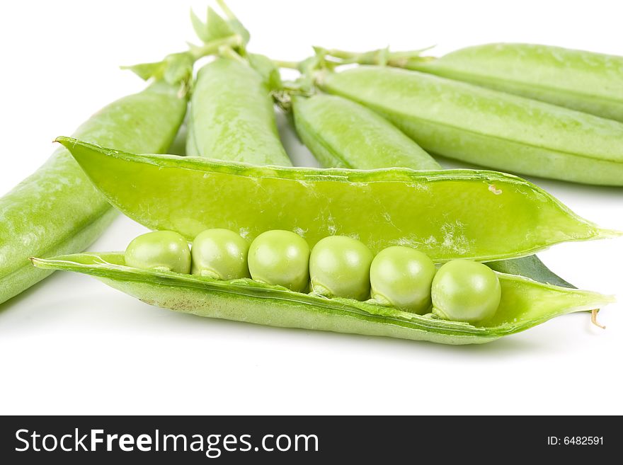 Fresh pods of peas on a white background. Fresh pods of peas on a white background