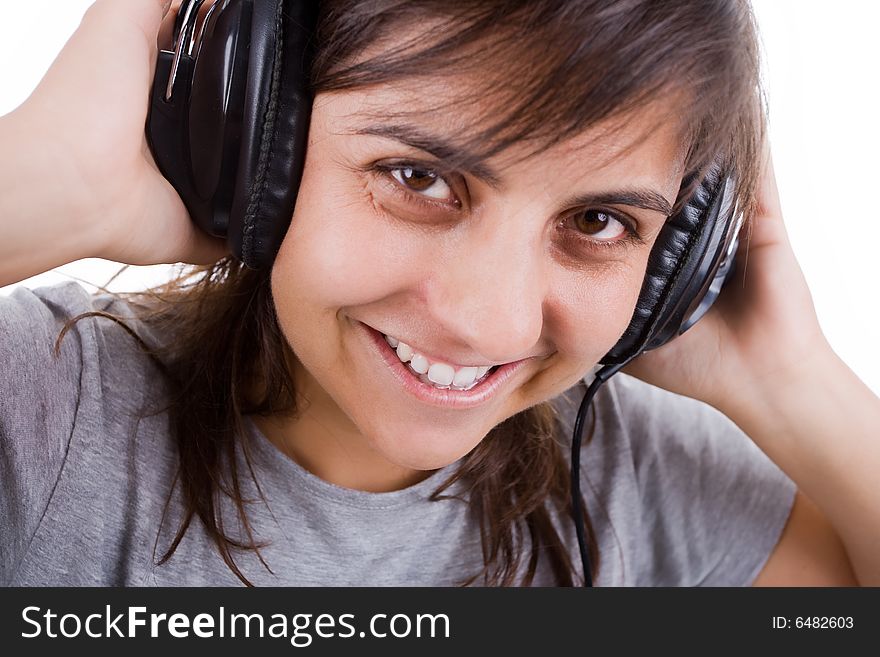 Young Woman Listening Music With Headphones