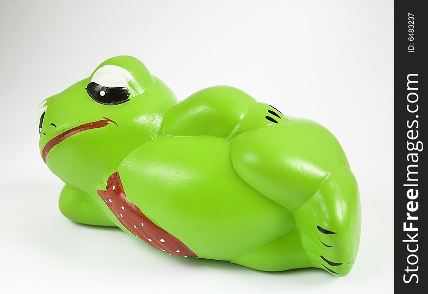 Ceramic made frog in lazy position. Ceramic made frog in lazy position.