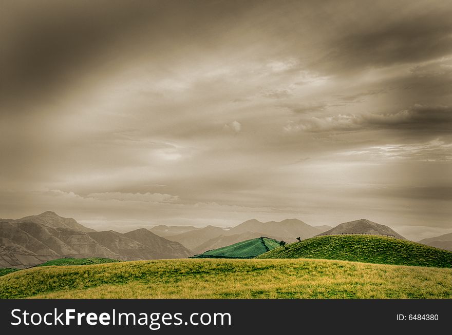 Beautiful hdr landscape with mountains and cloudscape. Beautiful hdr landscape with mountains and cloudscape