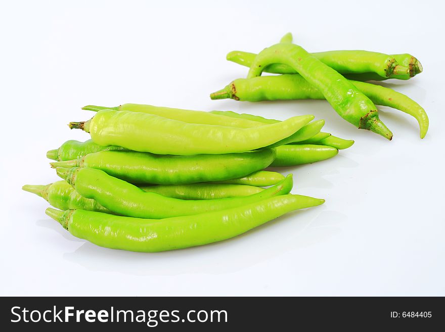 A bunch of green  pepper isolated on white background. A bunch of green  pepper isolated on white background