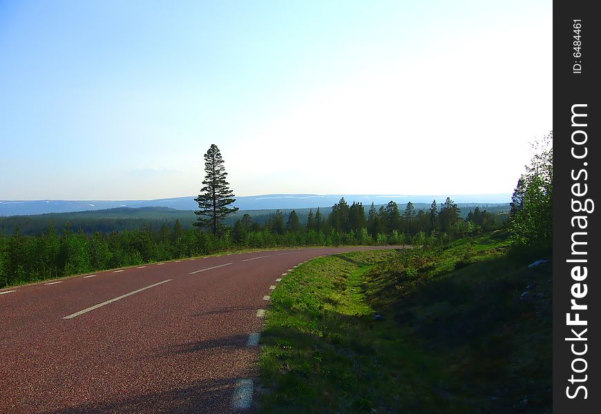 A Norwegian red asphalt road.