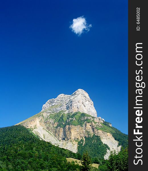 Lonely cloud above a mountain. Lonely cloud above a mountain