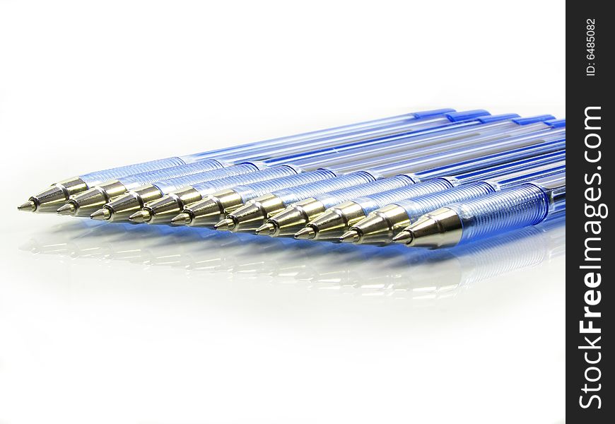 Set of ball-point pens on a white background