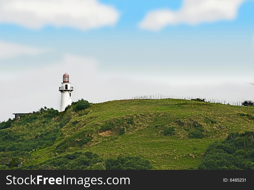 Batanes Philippines lighthouse blue sky green mountain