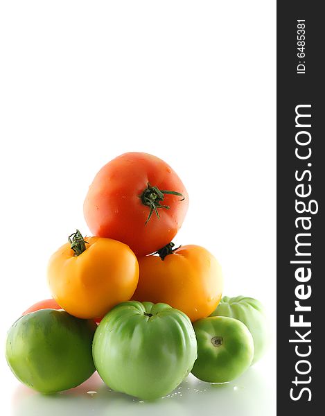 Some freshness multicolor tomato on white background. Some freshness multicolor tomato on white background