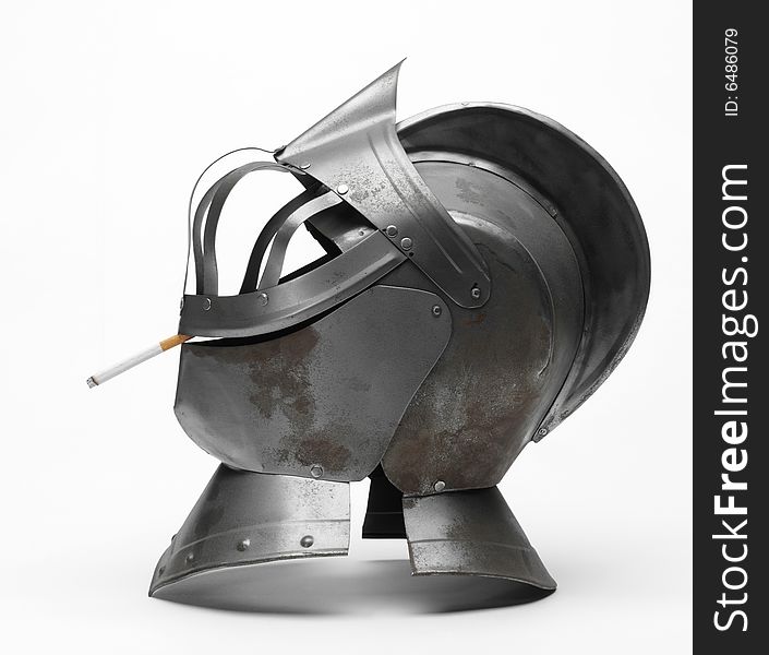 Image of a knight's metal helmet on a white background. Image of a knight's metal helmet on a white background