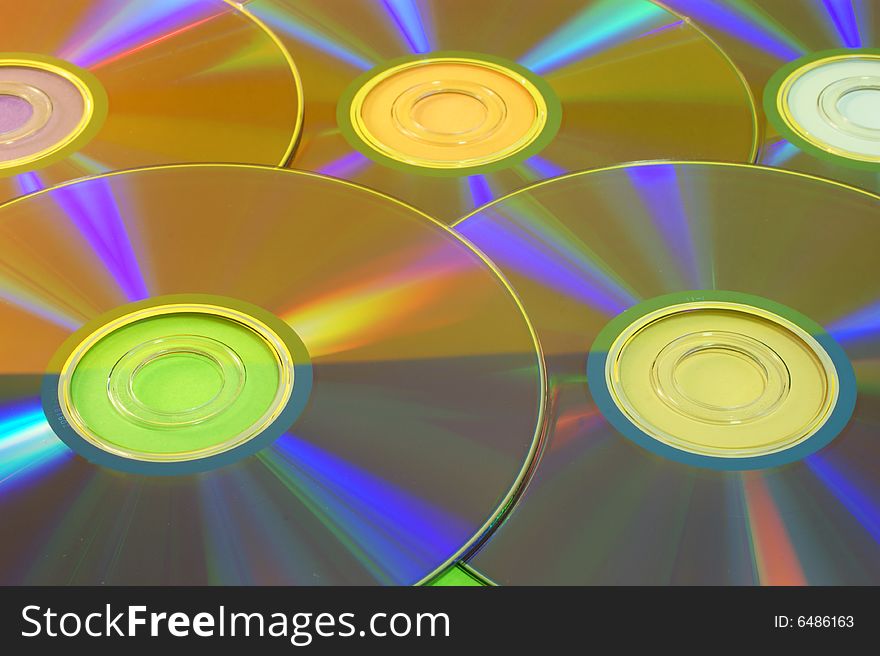 A simple background with five colorful disks