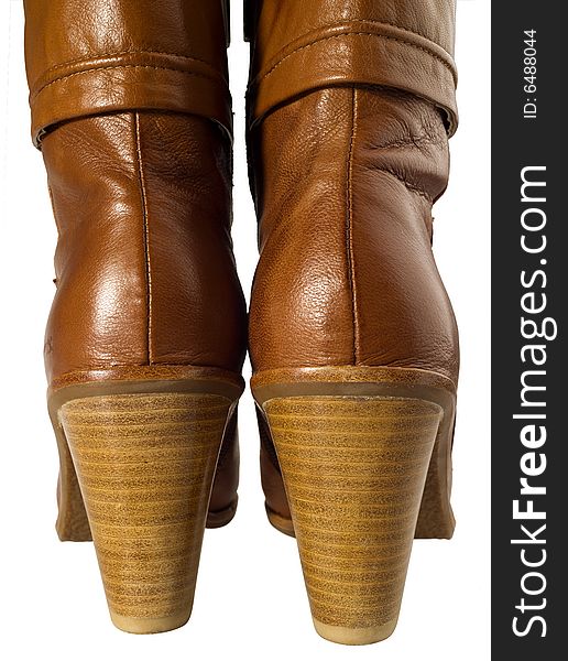 A brown and fashion boots with white background