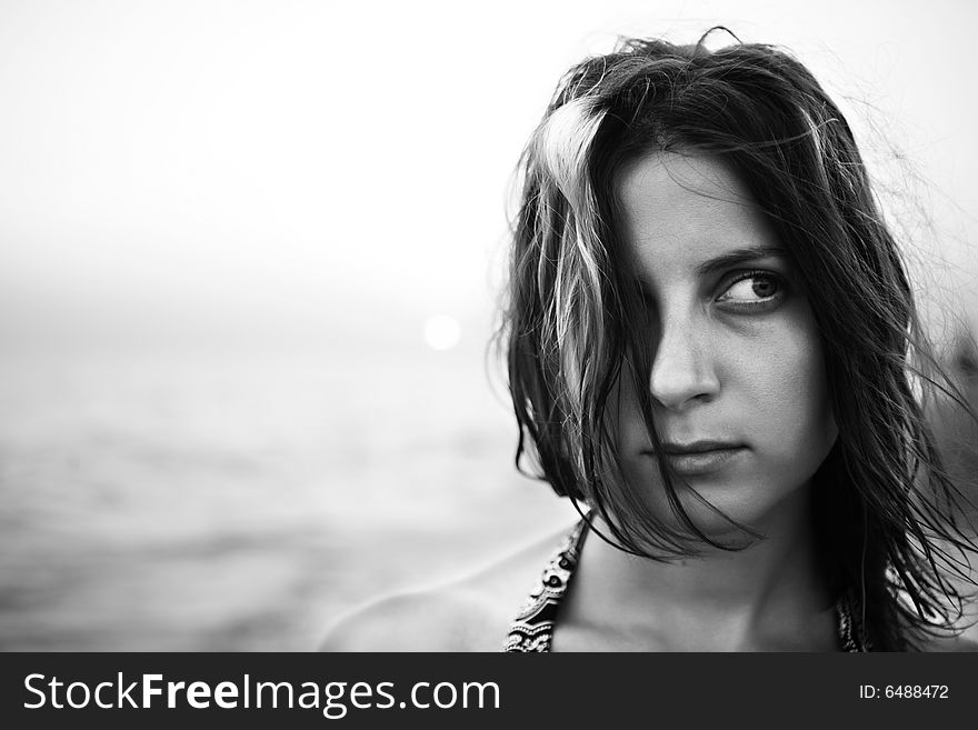 Woman with fluttering hair. bw portrait