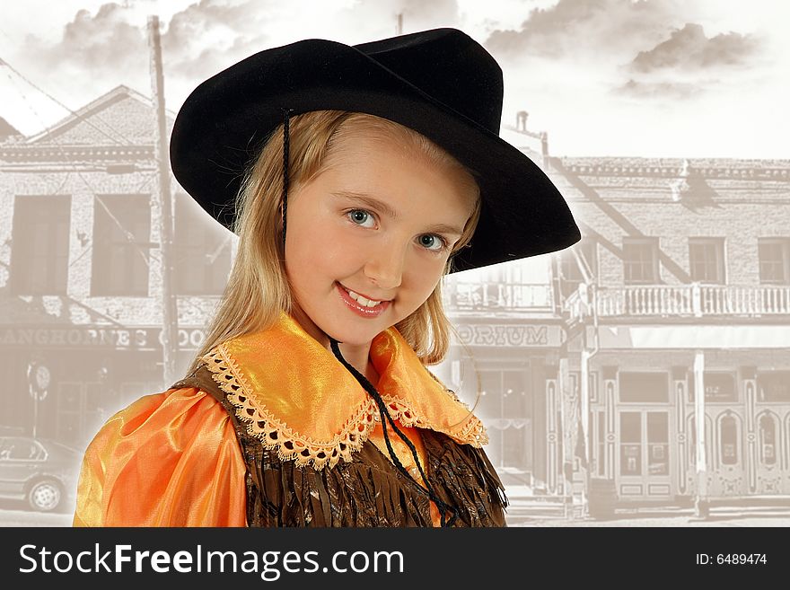 Blonde beautiful young cowgirl studio shot portrait. Blonde beautiful young cowgirl studio shot portrait