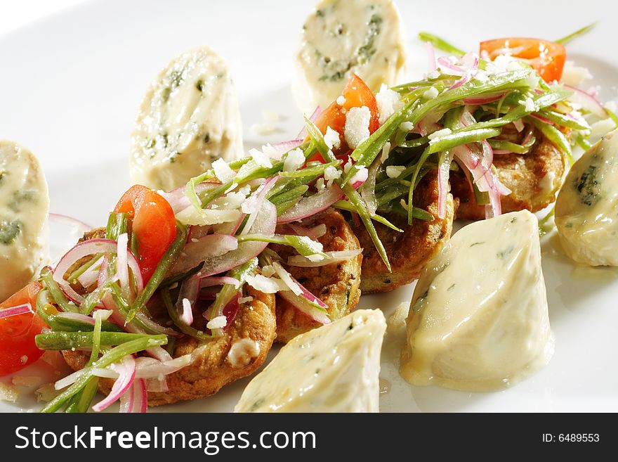 Chicken Roll with Vegetable Marrow Galette and Julienne Vegetables