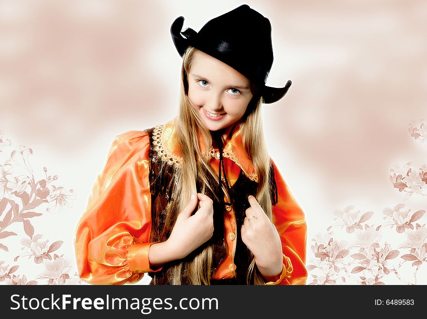 Blonde beautiful young cowgirl studio shot portrait. Blonde beautiful young cowgirl studio shot portrait