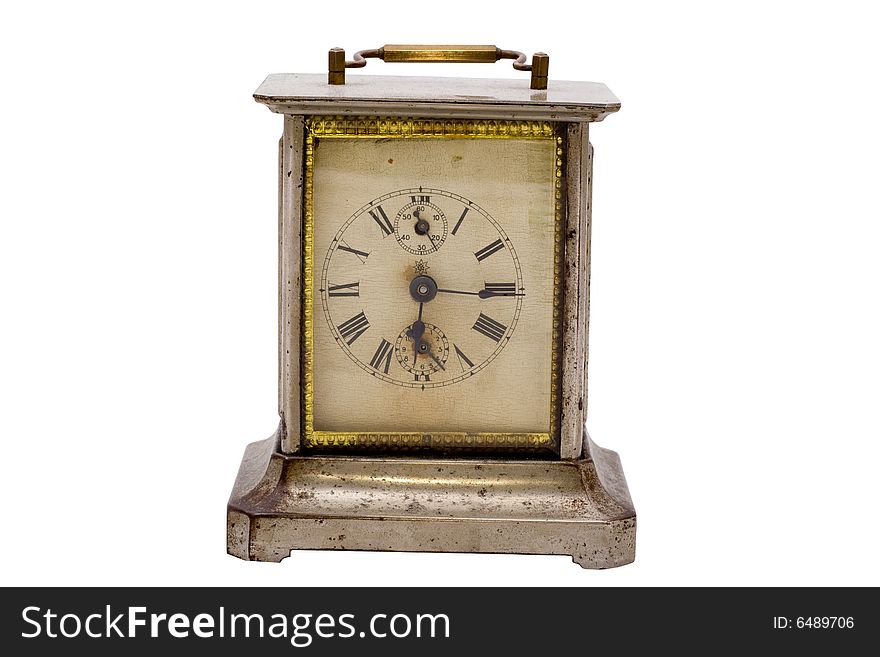 Vintage golden brass clock front view with clockface. Vintage golden brass clock front view with clockface