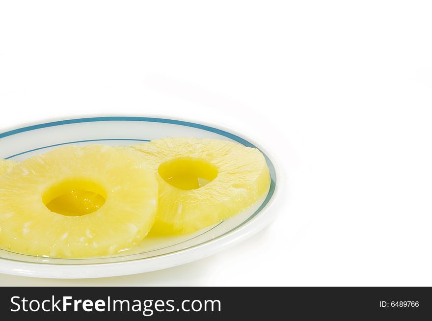 Two slices of sweet dried pineapple on white background. Two slices of sweet dried pineapple on white background