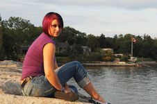 Girl Ssitting On Lakeshore. Stock Photos Girl Ssitting On Lakeshore. Stock Photos