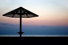 Umbrella On A Beach. Evening Stock Photo Umbrella On A Beach. Evening Stock Photo