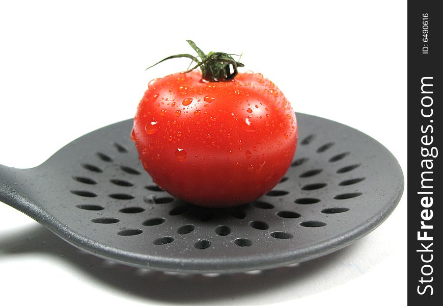 Ripe Tomato And Kitchen Tools