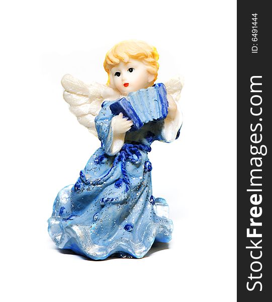 Statue of little angel on a light background