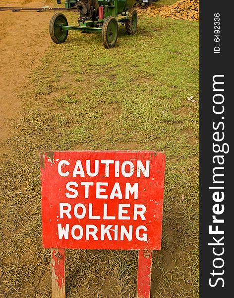 A sign at some road works warning of steam rollers. A sign at some road works warning of steam rollers