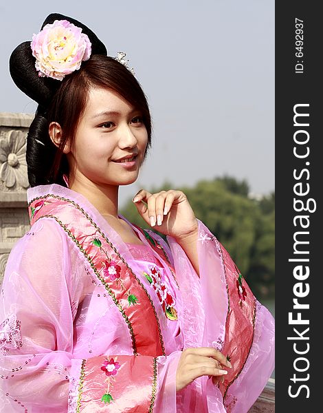 A girl in Chinese ancient dress. 
She is so beautiful . A girl in Chinese ancient dress. 
She is so beautiful .