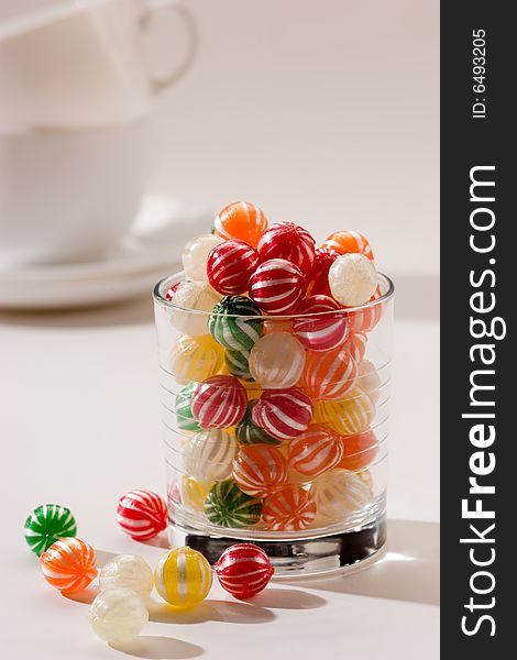 Food serias: cup with striped sugar candy