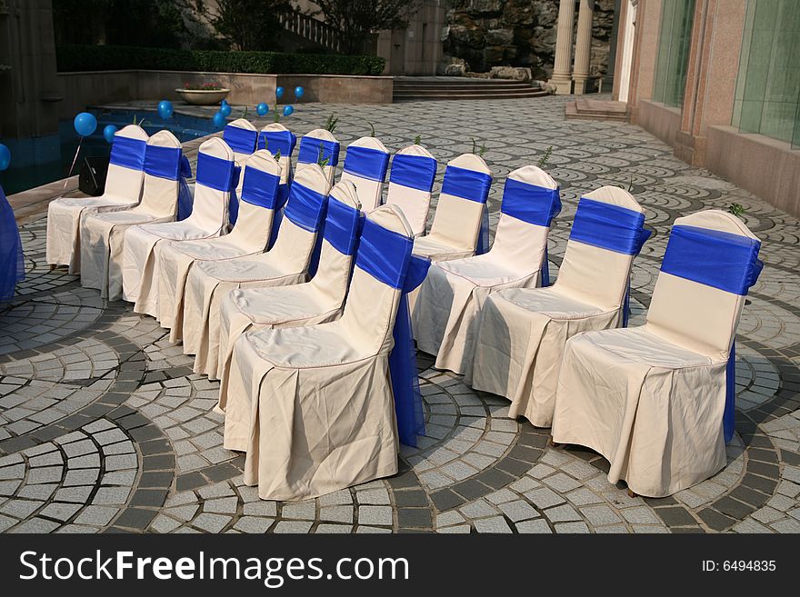 Outside wedding chairs preparing for a celebration