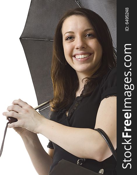 A modern dressed, young woman holding an umbrella. A modern dressed, young woman holding an umbrella