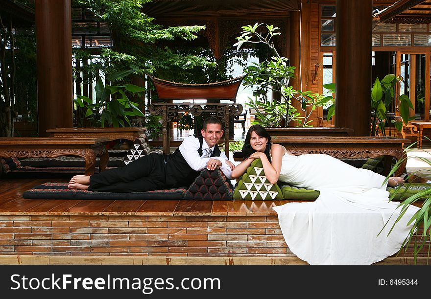 Bride and groom in tropical Thailand.