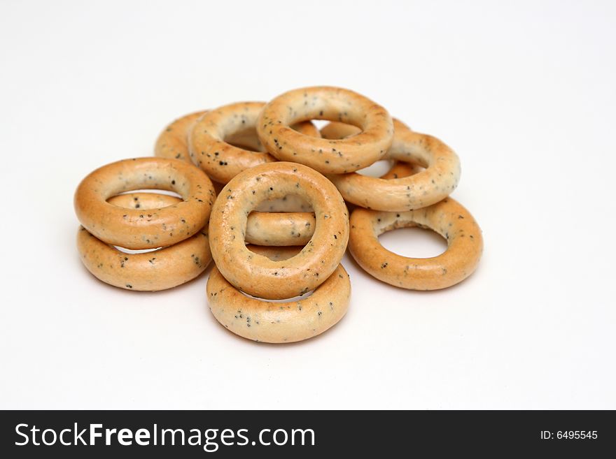 Bunch of rubicund bagels isolated on white