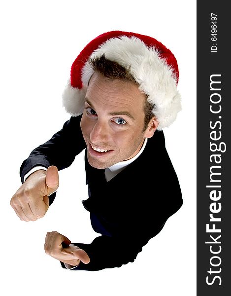 Caucasian businessman with cheer up and santa cap on an isolated white background. Caucasian businessman with cheer up and santa cap on an isolated white background