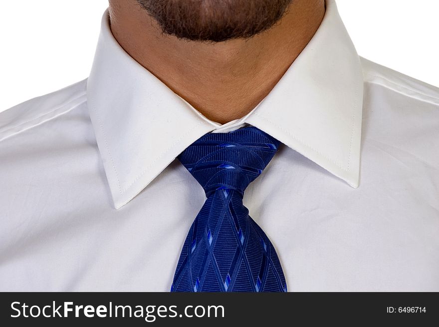 Close up of tie against white background