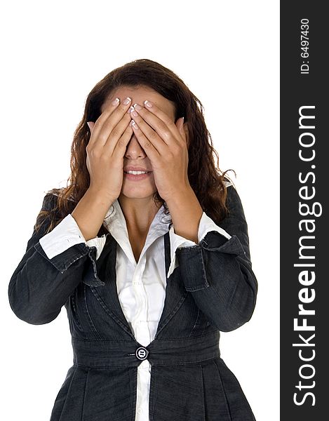 Lady closing eyes with hands against white background