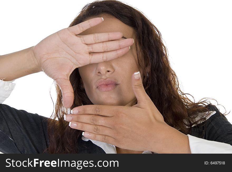 Female posing with hands on an isolated background