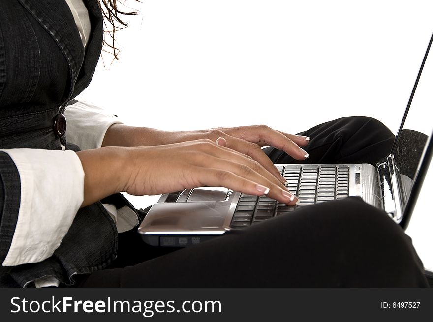 Female working on laptop against white background
