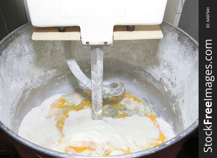 Pastry dough in mixer machine. Pastry dough in mixer machine