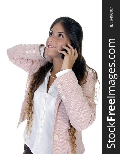 Standing woman talking on mobile against white background