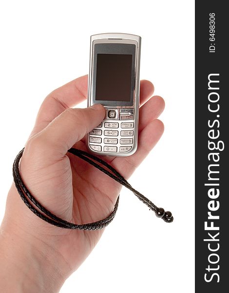 Small Silver Mobile Phone Device in hand. Small Silver Mobile Phone Device in hand