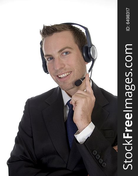 Young man calling with headset and smiling on white background