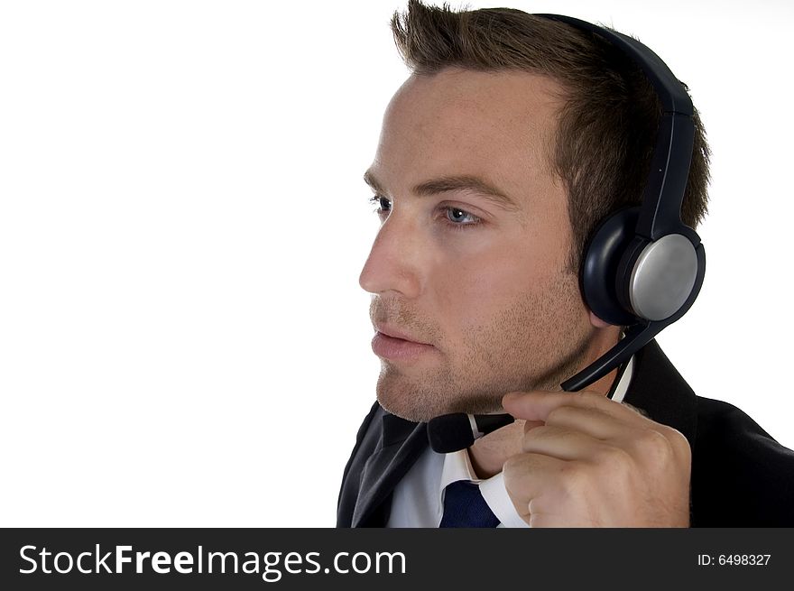Businessman busy on phone call with white background