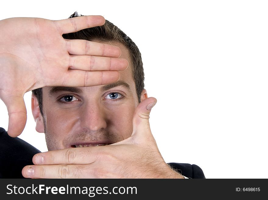 Businessman gesturing with fingers against white background