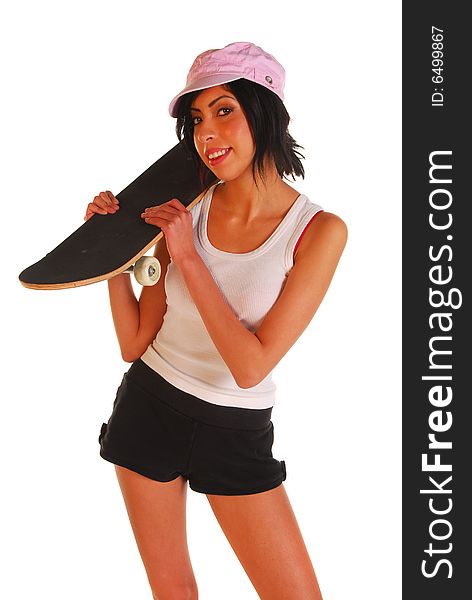 Attractive young hispanic woman holding a skateboard. Attractive young hispanic woman holding a skateboard