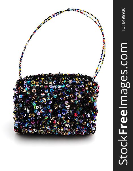 Shot of a pretty multi coloured sequinned bag. Shot of a pretty multi coloured sequinned bag