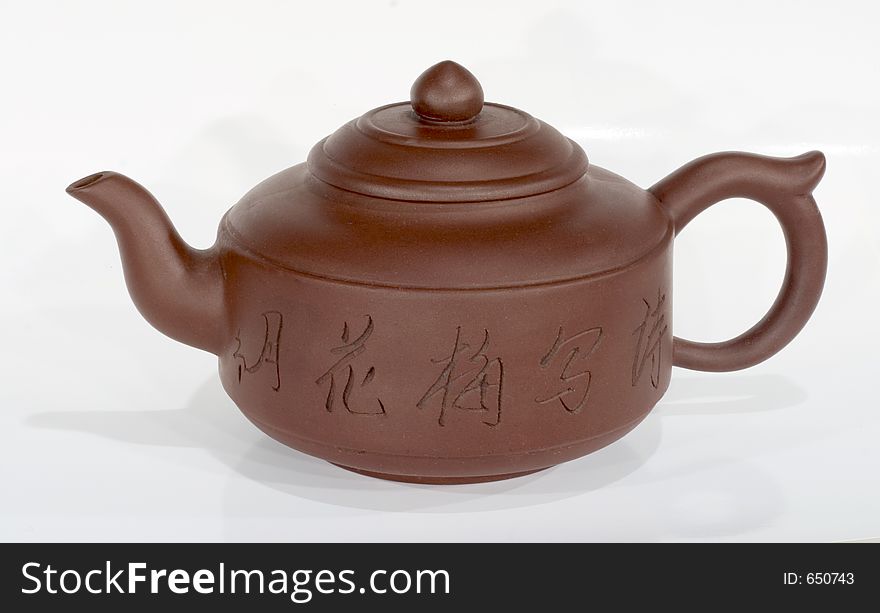 China teapot at white